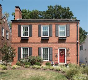 Stately all brick 2 story with great curb appeal on desirable U.City street. Charm abounds in this 3 bed, 1.5 bath with 1650+ sq. ft. All new driveway and custom landscaping.  Fresh paint and wood floors give this home a warm, welcoming feel.  Spacious living room with gas fireplace and tons of natural light.  Large dining room adjoins glass enclosed porch.  Kitchen features stainless steel appliances including gas stove and pantry.  Large upstairs master bedroom with walk in closet walks into full bath.  2 other bedrooms with wood floors. LL Rec Room is perfect for guest room or office. 2 decks in backyard are great for a BBQ. 2 car garage. Mins from The Loop and Clayton business district.  Great value on move in ready home in prime Location.