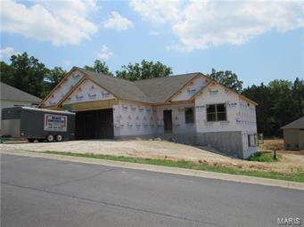 One of the few remaining premium lots in Cedar Berry Estates is where you will find this ranch home currently under construction offering 1852+\- square foot with lots of bells and whistles! 3 bedroom, 2.5 bathroom, and over-sized 3-car garage! The great room offers wood flooring, vaulted ceiling, and floor to ceiling gas fireplace with stone accents! This divided floor plan offers over-sized master suite with (2) walk-in closets, tray ceiling, separate stool area, custom tile shower, and double vanity with granite tops! The kitchen offers staggered maple cabinets, walk-in pantry, breakfast bar, some stainless appliances, and granite tops! Off the breakfast room you will find an over-sized covered deck that you fall in love with! The open staircase to lower will offer oak knell posts and wrought iron spindles! The walk-out lower level offers rough-in bathroom, 9ft ceilings, and lots of extra windows for natural light! This home sits on a corner lot offering over 1/2 of an acre!