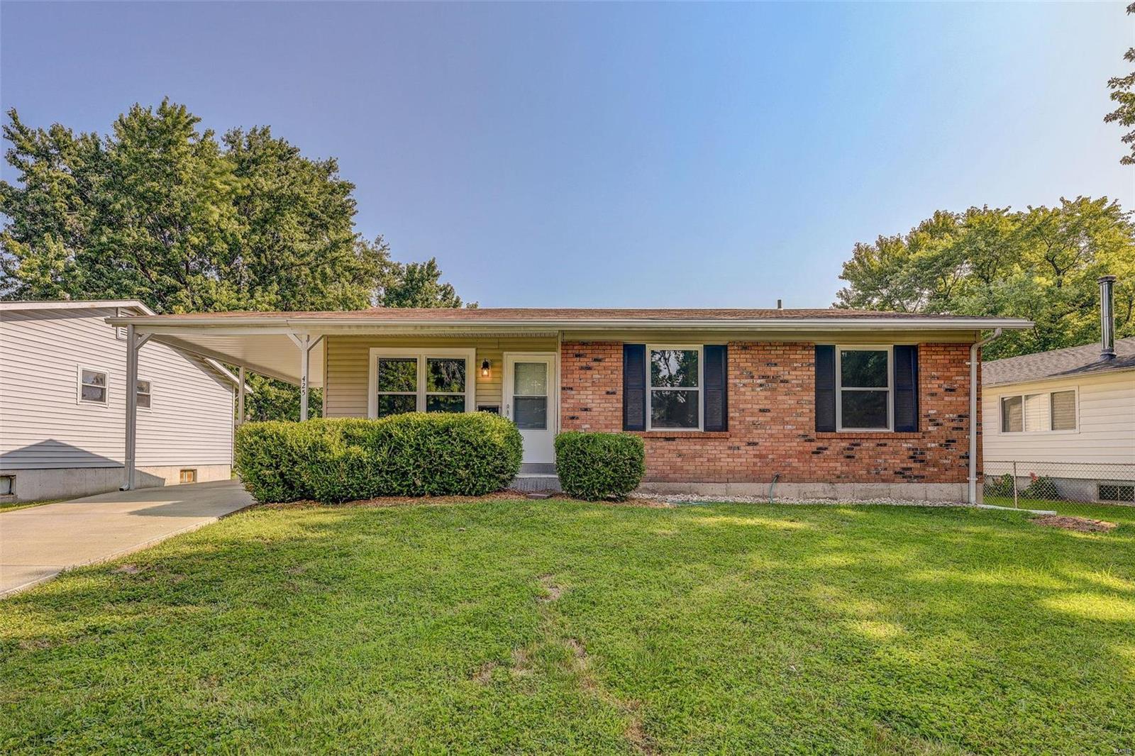 Incredible opportunity to own this newly renovated 3 bedroom ranch home on a quiet street in Florissant. New roof, attic insulation R-38, radon mitigation completed, new sewer lateral; this home has passed the rigorous Florissant inspection and is ready to go! Home features include original hardwood floors, new windows throughout the main level, two new bathrooms (one shower, one tub) and a new concrete driveway. Downstairs there is a full unfinished basement just waiting for the new owners to finish as desired.  Enjoy preparing meals in the sunny kitchen with the new white cabinets, neutral counter tops and updated luxury vinyl floors.Electric  stove, built in microwave, dishwasher, stainless steel sink, disposal and new lighting make prep and cleanup a breeze!  The dining space is large and has large picture windows for ample natural light. It will easily accomodate your largest table for holiday gatherings.  Convenient to shopping, restaurants, and highways. Priced to sell!  Hurry!