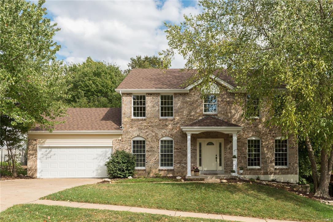 This stunning 2 story home is full of space for you and your family! With 5 bedrooms and 3.5 baths, each of your loved ones can have a nook to call their own. This home features a wood burning fire place for those chillier months, and a subdivision pool for those hot summer days. The kitchen is beautifully updated, and just a step through glass doors away from a fabulous brand new wooden deck, which also covers a walk out patio on the lower level. Newly installed carpet and main floor laundry are just a few more of this home's impressive features. Located in beautiful Wildwood in the Rockwood School District.