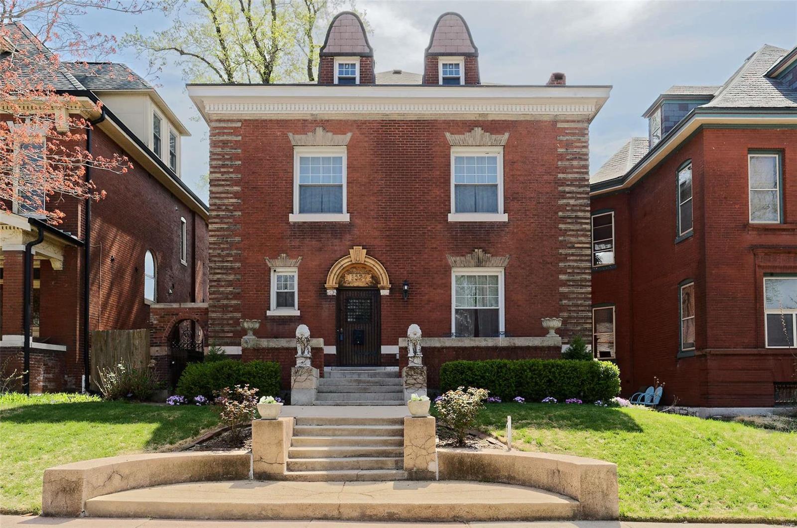 Magnificent 4BR 4.5 Bath turn of the century French inspired home is very open and spacious.  Expansive entry foyer leads to dramatic original staircase, stained glass window, and leads to formal living, dining and generous fully appointed kitchen. Servants staircase is an easy way to the 2nd fl with master bedroom suite, jacuzzi tub, double sinks/ separate shower, walk in closet and two additional guest bedrooms/bath.  3rd floor has vaulted family/media/play room, with additional guest bedroom/full bath for convenience.  Lower Level has recently renovated in-law's apartment with kitchen/bath, living/bedroom area & separate entrance. Could be Airbnb. Expansive back yard is landscaped with lovely deck and large patio areas for enjoyment and entertainment, with privacy fence and newer two car garage.    Great location with walkable neighborhood near Grand restaurants & shops and very close to Tower Grove Park & campuses  This home is rich with charm and in the heart of Tower Grove East. COOL: 14 SEER+