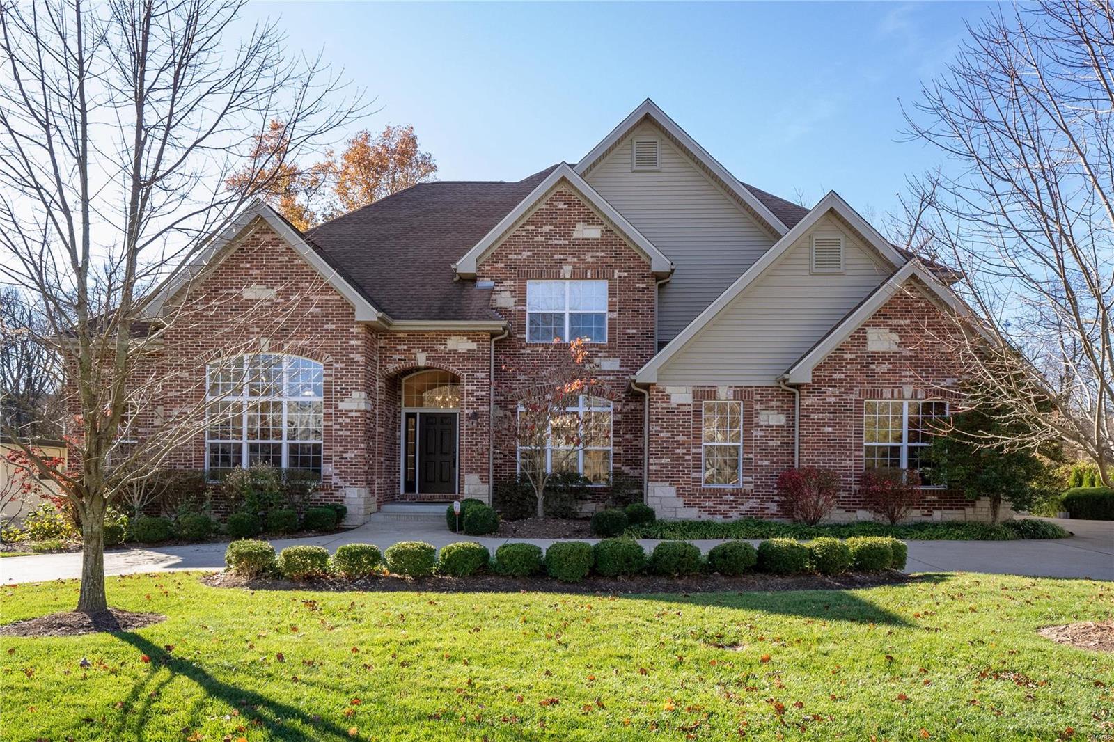 Exceptional, 10 year old Kelly built home, in Harwood Hills. The 1 1/2 story home offers the open floor plan, large entry, soaring ceilings and the master suite on the main floor. Large great room, with a wall of windows, fire place, opens to the eat in kitchen, with excess to the large deck and patio. Not to forget the open, gourmet kitchen with stainless appliances, lots of working/prepping space, for more than one in the kitchen! The private half bath serves your guests and family conveniently off of the large entry. The main floor laundry is conveniently located, just steps from the kitchen and the mudroom. The second floor offers 3 nice size additional bedrooms, 2 full baths and walk in closets. The large family room is in the lower level with a ventless fireplace, plus 5th bedroom and the 4th full bath. The private rear yard, offers great entertaining space, dry bar, extra decking for large sitting area, giving you plenty of room to gather with family and friends. Additional Rooms: Mud Room