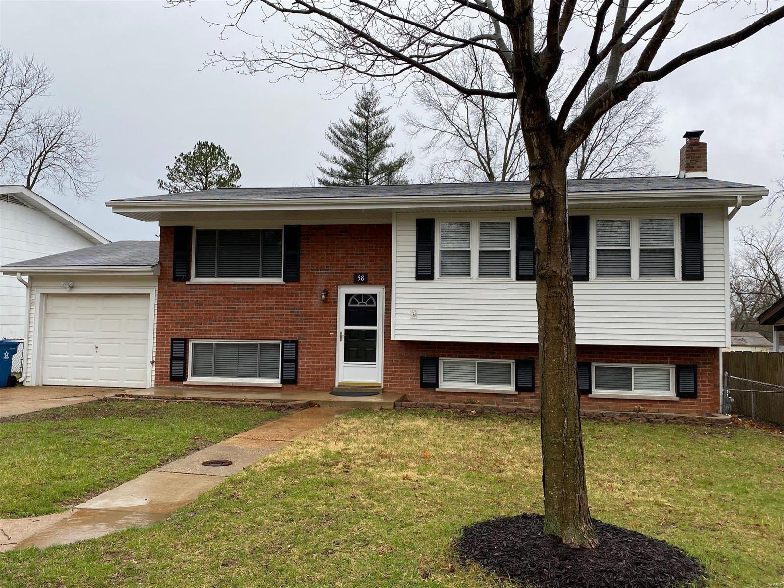 Fully Renovated 4 bedroom / 2 full bath in Parkway School District.  Huge open floor plan on the main level with living, dining and kitchen continuous.  Beautiful hard wood floors with soft grey wall paint and white trim throughout.  All new kitchen cabinets, counters, and appliances.  Easy access to new composite covered deck and stairs to backyard and patios.  Plenty of room for entertaining.  Three bedrooms on the main floor with ceiling fans and 2" blinds.  Both full bathrooms have luxury vinyl tile and all new fixtures.  Main floor bath has tub/shower combination and basement bath has the walk-in shower.  Basement features oversized recreation room with vinyl plank flooring and access to the rear patio, bedroom with window egress, full bath, and storeage/laundry.  Fenced backyard with pull through single car garage and/or workshop.  Walking distance to Manchester Road shops and restaurants and Reber Park.