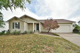 Tucked away on a peaceful subdivision you'll absolutely love to come home to, this wonderful 4 bed/3 bath ranch offers an inviting open floor plan you'll be certain to enjoy. The wide open floor plan boasts tall vaulted ceilings stretching above the great room, dining room & kitchen creating a spacious quality throughout the main living spaces. A sunny atrium walk-out grants access to the huge elevated deck with a terrific view. Retire in comfort to the nice-sized master suite where you'll find full length mirrored closet doors & a private full bath. The finished walk-out lower level adds the 4 bedroom, 3rd full bath, recreation room & family room with walk-out to the back patio & sprawling yard. Convenient parking with the attached 2-car garage & additional off-street parking. New carpets in all upstairs bedrooms - installed September 2015. Treat yourself with an Appointment Today!