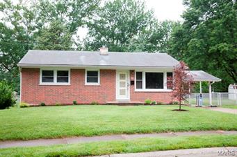 WHAT AN ADORABLE STARTER HOME!!!  Very cute 3 BDR, 1 BTH home in very desirable MIDTOWN St. Charles neighborhood.  NEW LANDSCAPING welcomes you to a freshly painted front door.  Other updates include a COMPLETELY REMODELED FULL BATH and NEW CARPET IN ALL BEDROOMS AND HALLWAY.   All rooms have been FRESHLY PAINTED completing the neutral palette of the home.  Just add your own unique style!  Hardwood floor refinished early 2014.  Newer furnace and electric panel (2013).    Backyard is level with a nice concrete patio for entertaining and has a utility shed for extra storage.  Lower level has large recreation room,  a dry bar and has been FRESHLY PAINTED, including industrial style ceiling.  Quiet street in the heart of St. Charles near grocery shopping, the library, and ice cream!  Bring the family!