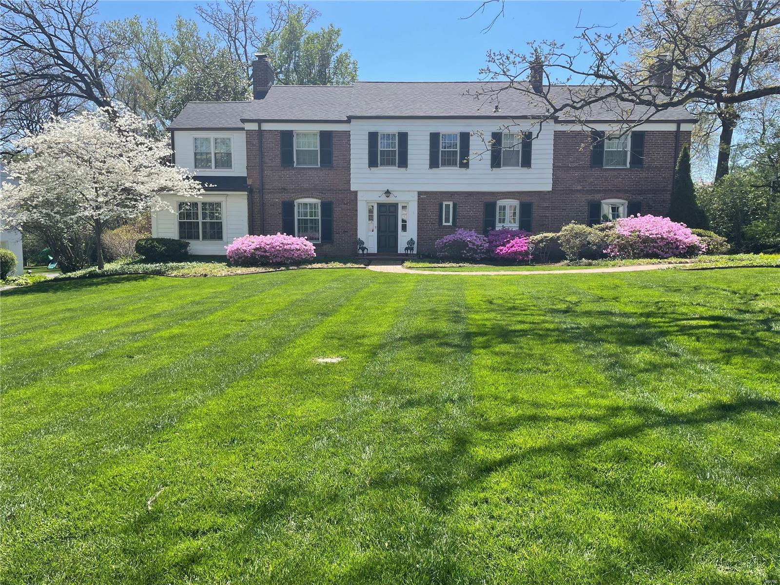 Beautifully situated on a spacious lot in the heart of Ladue, this 4 bedroom, 3+ bath home offers timeless charm and modern convenience.  Inside, you'll find formal living & dining rooms, a cozy den and a lovely hearth room adjoining the kitchen and breakfast area. The main floor includes a convenient laundry & mudroom plus 3 fireplaces. Upstairs, the primary suite boasts an updated en-suite bath with heated floor and generous closet space. 3 additional bedrooms, 2 full baths and a gracious second-floor landing with extra sitting space complete the upper level. There is also a large attic with pull-down stairs for additional storage. The partially finished lower level provides versatile extra living space. The property features a lovely pool with a dedicated half bath, making outdoor entertaining a breeze. A 3-car garage with attic storage adds even more functionality to this impressive home. Don't miss this exceptional opportunity to own a stunning property in an unbeatable location! Additional Rooms: Mud Room