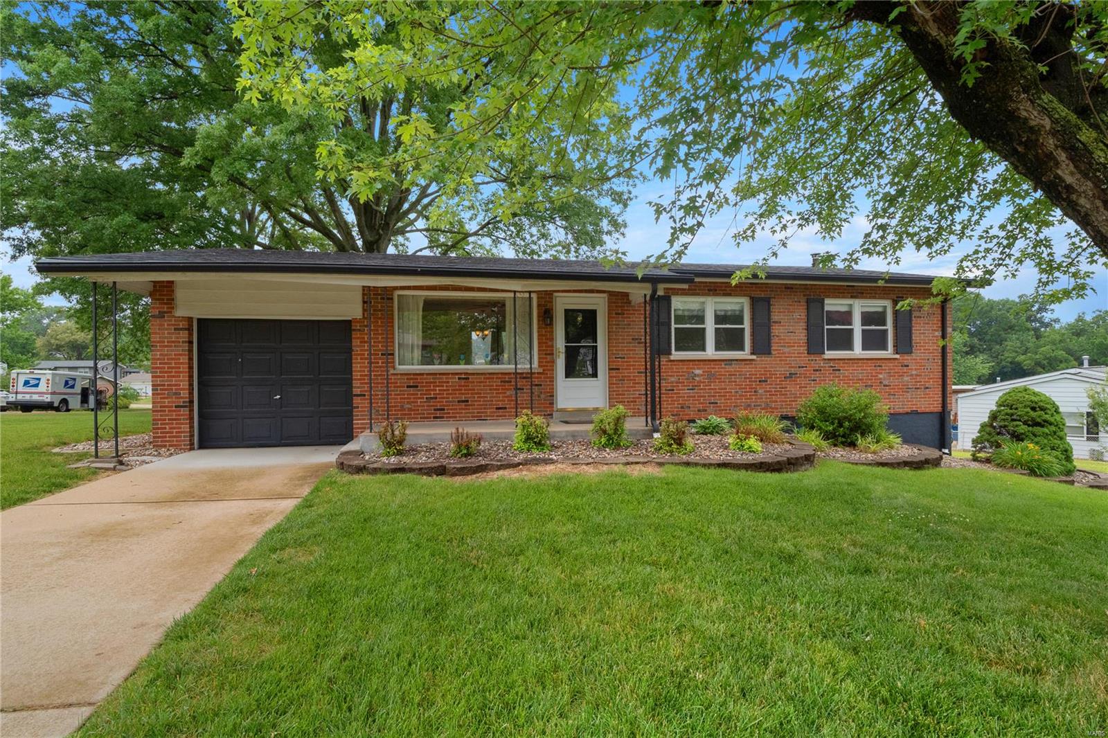 Welcome to 10733 Antrill Drive situated on a large corner lot in the Mehlville School District! The original owner has loved the home for years and now it's your turn. The main level is complete with three well sized bedrooms with gleaming hardwood floors, a beautiful updated kitchen/breakfast room featuring gorgeous cabinets with slide out shelving, ceramic tile flooring and a full pantry. Did I mention the refrigerator stays! A spacious living room with newer carpet (6/23) and an updated bath finish this level nicely. The walk out lower level offers a sizeable family room plus a wonderful Master Suite with a woodburning fireplace. Your own private hideaway! Prefer the outdoors, enjoy your expansive yard from the newer composite deck, the lower level patio, or possibly the covered front porch. You decide! Close to parks, shopping, restaurants and more! Green Park amenities are certainly an asset as well. Sounds like this home should be on your "must see" list!