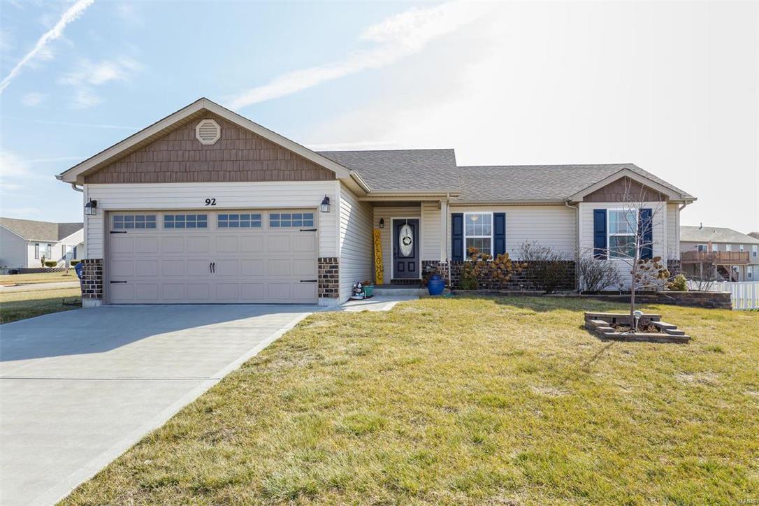 Don't miss out on this wonderful, four years young, three bedroom, 2 bath ranch.  Nothing to do but move in!  Beautiful kitchen with granite countertops, soft close cabinets & drawers, stainless steel appliances, tile backsplash, ceramic tile floors, breakfast bar & pantry.  Just off the kitchen is the main floor laundry room. Open floor plan with vaulted ceiling in family room, neutral carpeting, 2" blinds, oil bronzed levers, white 2 panel arched doors & trim, corner wood burning fireplace, & rounded corners.  Bathrooms offer ceramic tile floors and adult height, granite vanities.  Master bedroom is spacious & has walkin closet.  Lookout, unfinished basement with rough in for future bath.  Corner lot with enclosed soffits & facia.  Close to Hwys, schools & shopping.  Put this one on your must see list today!!