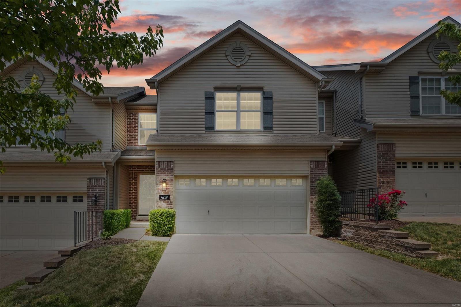 Enjoy low maintenance living in this immaculate 3 bed/3 bath townhome in convenient Oakville location. Gleaming wood floors greet you as you enter the open concept main level. Feel free to visit with your guests as you prepare meals in this upgraded kitchen while friends and family keep you company! The kitchen has 42" cabinets, quartz tops, tile backsplash, deep basin sink and newer faucet package. A full stainless appliance package is already in place. Main level has a powder bath. Just off the kitchen you will enjoy the patio with privacy fencing to entertain or enjoy a quiet coffee. Upstairs is the master suite with walk-in closets and private bath. 2 secondary bedrooms with full bath as well as laundry on this level. The washer and dryer stay also! In the lower level there is a large entertaining area as well as 2 separate storage areas. Along with the 2 car garage and extra parking spaces this home has it all! The seller is offering a 14 month home warranty.