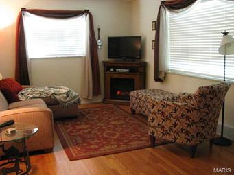 This is a great price for an updated condo that is within one block from Historic Downtown Kirkwood. Walking distance to Farmer's Market, Kirkwood Park, many local shops and restaurants. Beautiful wood floors in the living room and bedroom add a warm feel. Excellent closet space in unit, plus a 13 x 6 storage room in the basement. Newer kitchen with all the appliances you need, and an updated bathroom make this one ready to move in. There are many windows, to bring in the light, and the corner unit is surrounded by trees for shade and your view. The secured entrance features a intercommoned entrance. There is a patio and grassy area in the rear for outdoor relaxing. The waster and dryer in the unit wills stay, and there is also a laundry hookup in the basement. Your association fee includes water, sewer, trash, as well as the upkeep of this well maintained complex. Assigned parking right in front of your door. Location: Corner Location, End Unit