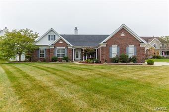 Simply Stunning ranch w/ 3 bdrms, 2 full and 2 half baths, side entry garage, beautiful landscaping plus it’s located in the highly sought after Ballantrae subd.  Step inside to the gleaming hardwood flrs leading you into an open floor plan with 12’ ceilings, gas fp, sep. dining room plus lovely transom windows that allows lots of natural light inside. Gorgeous kitchen features granite, maple cabinets, a butterfly island, planning desk, walk in pantry, double ovens and an electric cooktop. Luxury master suite offers a walk in closet, sunken tub, ceramic tile surrounding shower and flooring with double granite sinks. Add’l features include main floor laundry with ceramic flooring & new granite sink plus new lighting throughout. Enjoy entertaining on the private back patio with retractable awning.  This move-in READY home is conveniently located in the Lake St. Louis Area just minutes from Hyw 40/70 with shopping just minutes away. Amenities include Club House, Pool and Tennis Courts.