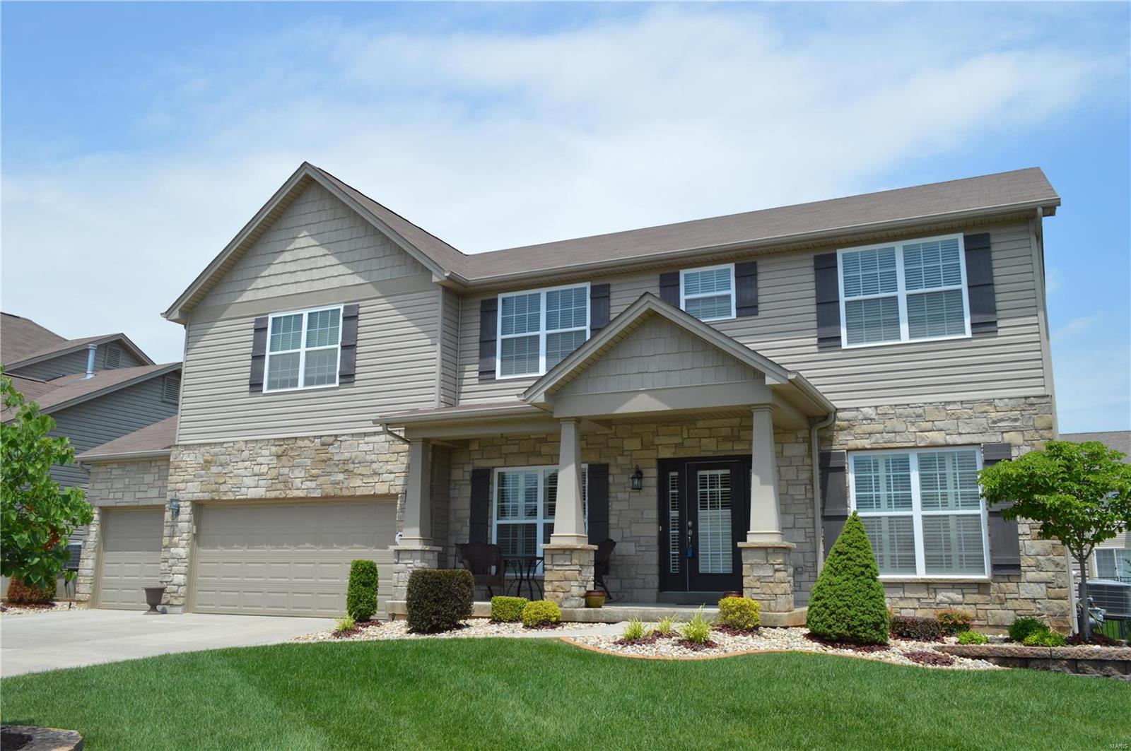 Stunning 2 story home in mint condition! New carpet, new paint, Cambria! Why build when you can have the perfect home NOW!. Great location close to I-70 & Bryan Road. Stately stone & sided elevation w/ covered front porch. Wood floor entry flanked by dining & office/den. Great room has stone gas fireplace & wall of windows ~ open to kitchen with espresso cabinets, stainless steel appliances & new Cambria countertops. You will love the spacious laundry room w/ added closet, cabinetry & tiled floor. Powder room on main level. Upper level boasts extremely large master bedroom suite w/spa like master bath, large tub, double sinks w/Cambria tops, 5' shower w/seat & huge walk-in closet. 3 more spacious bedrooms, J&J bath & full bath share the upstairs. Loft area is great place to unwind & relax. All wet areas are tiled. Fenced in backyard & irrigation system is added bonus to magnificent home. A few houses down from community pool makes it easy for you to easily enjoy. 4 bed/3.5 bath/3 car