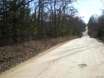 37.42 m/l acres that are wooded with mature trees and has 800 m/l feet of road frontage & close to town.