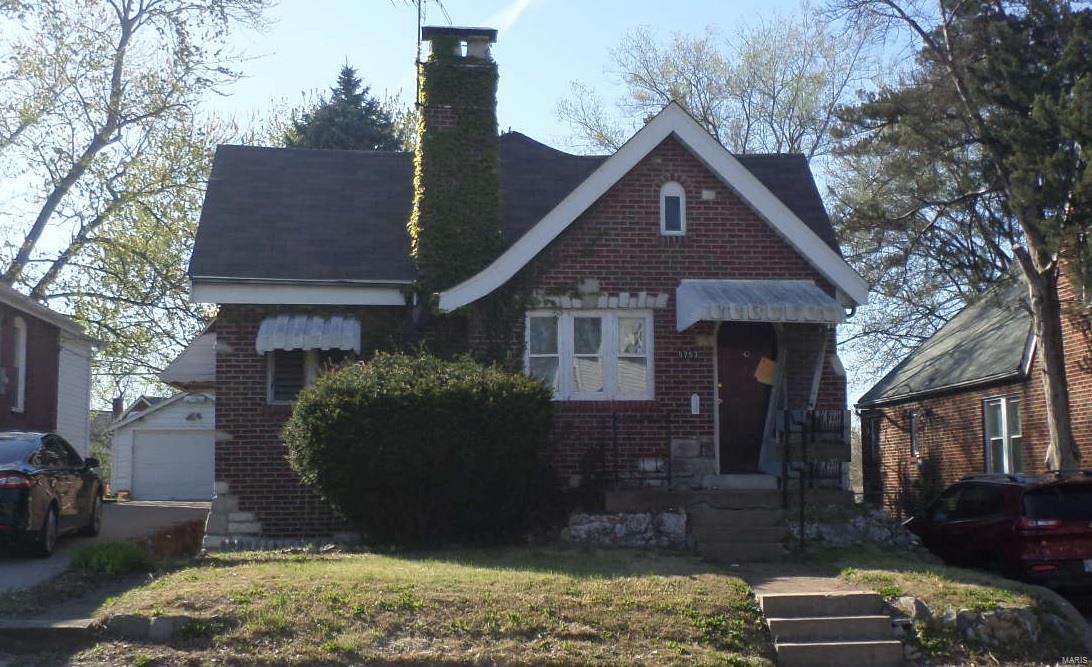 OUTSTANDING REHAB OPPORTUNITY!!!  This adorable brick bungalow features hardwood floors, rear enclosed porch, separate dining room, tiled bath, full basement, and detached garage!  Bring your updates and make this one shine!  Property is to be sold in its current as-is condition with no warranties or representations by the Seller. Seller will not make repairs nor provide any inspections. Seller's addendum is required after terms of sale are agreed upon. Special Sale Contract (Form #2043) required. Proof of funds is required with offer.