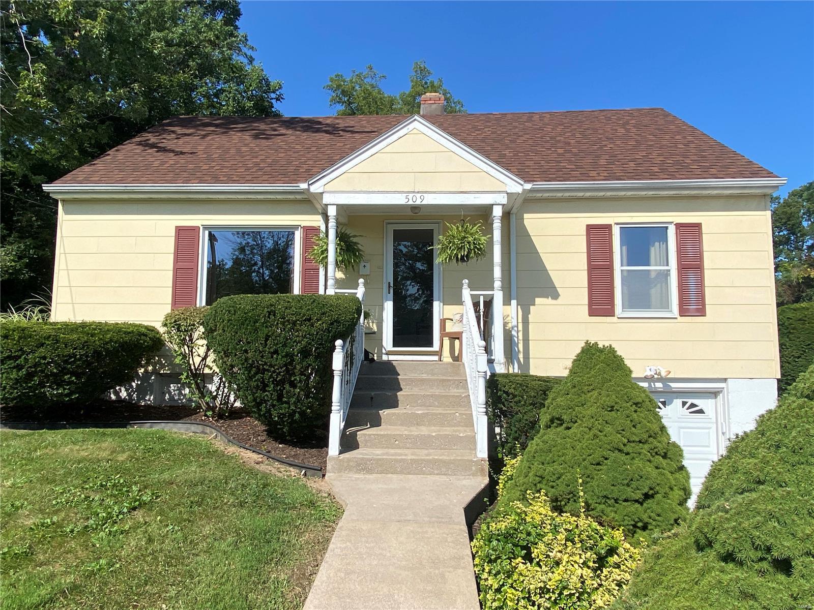 Well-kept home that is move-in ready with 2,200 square feet of living space! Home offers living room with large picture window. Kitchen has wood cabinets and separate laundry and wet bar area. Off the kitchen is large family room. Family room has some built-in shelving, large pantry/storage area, and access to the second level. There is also access to a concrete patio area that overlooks the backyard. The main level also offers one bedroom and one full bathroom. Upstairs, accessed from front stairs or family room stairs, has two bedrooms and one bathroom. Each bedroom has hardwood floors and large closets. One bedroom has built-in bookcases and desk. Upstairs also offers bonus room that could be office or sitting area. Storage is abundant with storage on main level, upstairs, and basement area. Unfinished basement with storage shelving and one car garage. So much to offer in this three bedroom, two bathroom home.