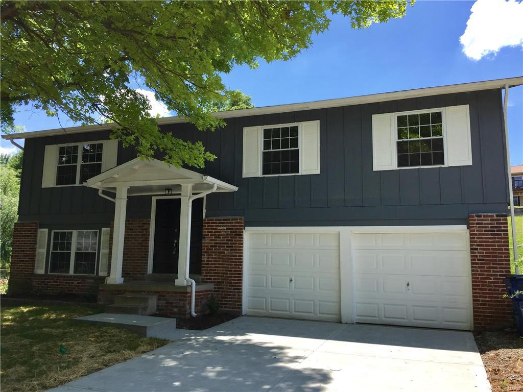 You're going to LOVE the UPDATES in this 4 Bedroom home in Oakville Schools! NEW KITCHEN, NEW BATHS! Freshly Painted Interior & Exterior in Today's Modern Colors! NEW & Gorgeous Flooring! OPEN & SPACIOUS w/ Large Living Room OPEN to Kitchen & Dining area. ALL NEW Kitchen features NEW White Cabinets & Breakfast Bar all w/ GRANITE tops! NEW Stainless appliances - Side x side Ref, 5 Burner Stove, Built-in Microwave & Dishwasher, Beautiful Subway Tile Backsplash. Stunning Vinyl Plank Flooring here & in Dining area, which walks out to Huge, freshly painted Deck & Large, Fenced yard. Master Bedroom w/Gorgeous NEW Master bath w/NEW Vanity & Beautifully Tiled Shower. 2nd Full Bath also w/ NEW features. 1500 sq. ft. here including MORE SPACE on Lower Level w/ 4th Bedroom & Family Room walks out to Backyard. New Lighting, New Windows in front & Newer Windows throughout. New Furnace & A/C, NEW DRIVEWAY. Close to Hwy 255/270, shopping, restaurants!