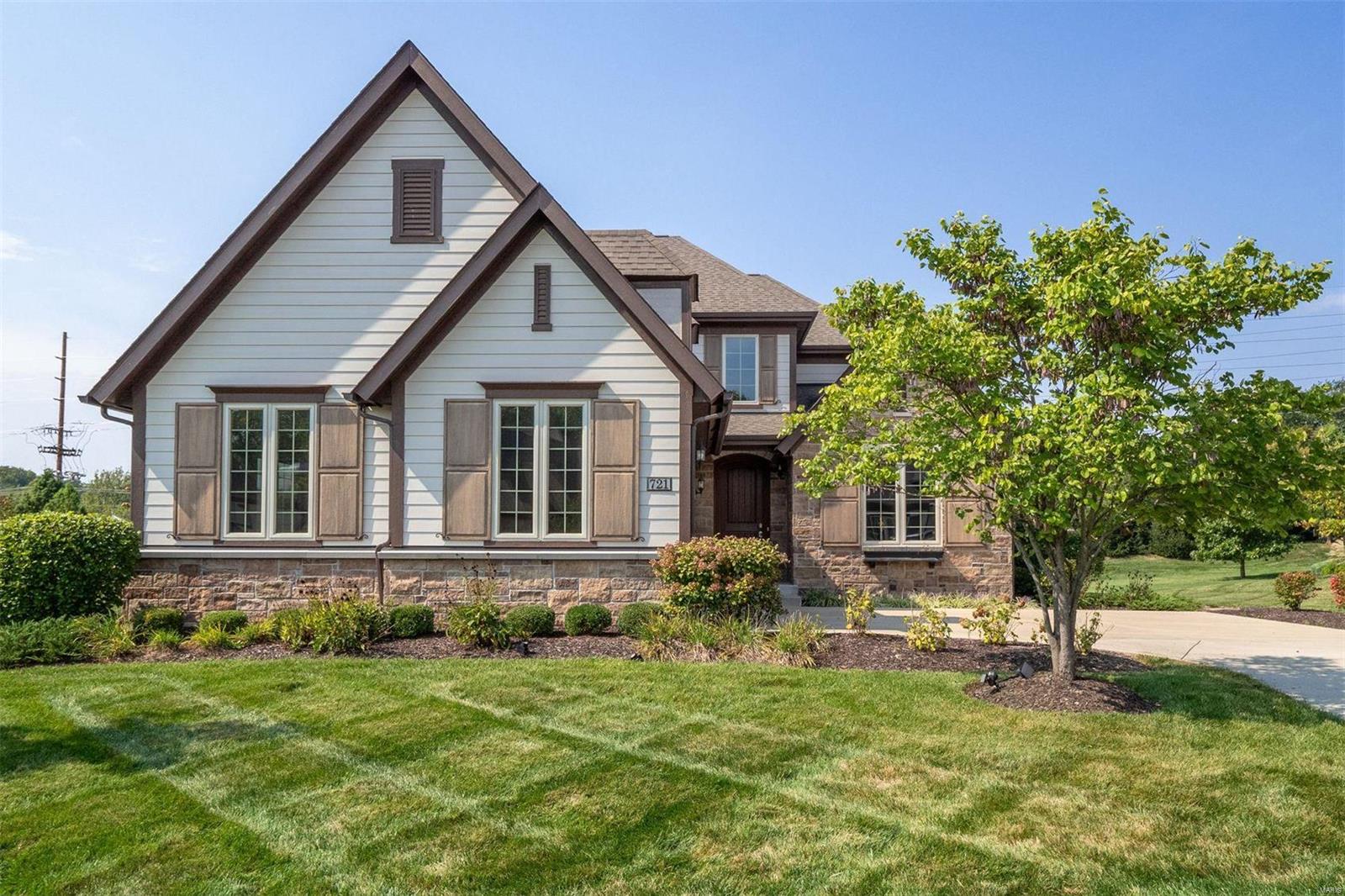 Spectacular home in desirable Ladue is move-in ready! This stunning 6 year old home has an open floor plan with 2 story dramatic great room with soaring ceilings featuring a rich, stone surround fireplace & an abundance of light. Soothing neutral colors surround on walls & flooring to make the perfect transitional backdrop for any style. The designer kitchen has quartz countertops, large center island, stainless appliances, oversized pantry, breakfast room, & Butlers pantry leading to dining room. An expansive main floor primary suite has custom built-ins, 2 walk-in closets, & a spa-like bath featuring a large steam shower, separate tub, double sinks, & makeup station. The study, powder room, laundry, & mud room complete the main floor. Upstairs has 2 bedrooms joined with a jack and jill bath, & a great bonus room. HOA perks like landscaping & snow removal are included. Amazing location in top-ranked Ladue schools, luxury finishes, convenient lifestyle- makes this a great opportunity.
