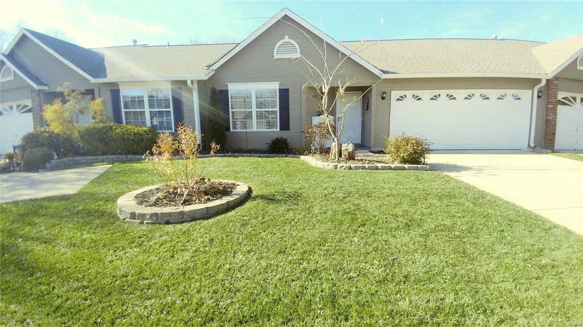Welcome home to maintenance free living on the lake! Outstanding, move in ready villa boasts 2 spacious bedrooms and 1.5 baths. Open floor plan, vaulted ceilings, hardwood floors throughout AND an updated kitchen w/ stainless appliances, granite, breakfast bar, two toned cabinets w/ new hardware & under cabinet lighting! Bathrooms have both been fully remodeled w/ new vanities, paint, hardware & a walk in, oversize shower. The list goes on w/ a new roof (2016), new thermal storm doors, rubbed bronze hardware throughout, updated lighting, central vac, new furnace & A/C (2015) & new window treatments. Two car garage offers closet w/ shelving, ceiling fan, insulated garage door plus shelves & lighting in attic for extra storage. Step outside to the meticulously maintained yard & LAKEVIEW! Enjoy the ceiling fan breeze and large patio while taking in the view. Enjoy the walking trails, pool & clubhouse since your exterior maintenance is done for you! Great location-this one will go quick! Location: Ground Level