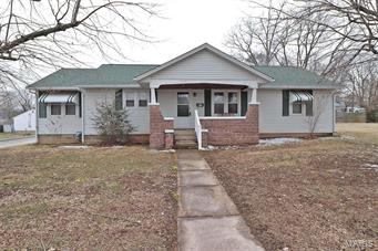 Affordable and Adorable!  This three bedroom ranch has a living room, family room plus a den!  Also offers a full unfinished basement.  Awesome covered front porch for afternoon tea or morning coffee.  Attractive HOME!