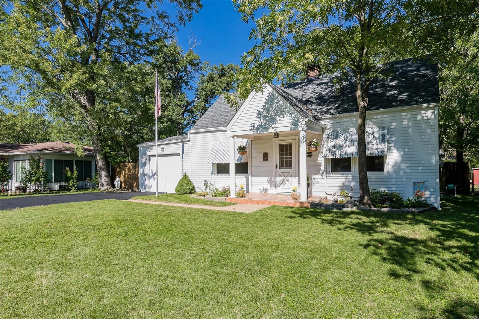 CHARMING BRENTWOOD/ROCK HILL AREA COTTAGE W/1CAR GARAGE & WOOD DECK/GAZEBO, STONE PATIO, ALL OVERLOOKING PRIVATE FENCED BACKYARD ON QUIET STREET NEAR TILLES PARK! HOMEOWNER LOVES HOME..BUT ITS TIME TO MOVE ON---SO MUCH POTENTIAL FOR THE BUYER W/TONS OF CHARM W/ITS' METAL AWNINGS, TILE FRONT PORCH, COZY BACK PATIO/GAZEBO & YARD..HOME HAS SOME NEWER WINDOWS, 3YR ROOF, 6YR HVAC & UPDATED ELECTRIC OFFERS PEACE OF MIND! THE FRONT ENTRY OPENS TO NICE SIZED LIVING RM W/LOTS OF LIGHT & HARDWOOD FLOORS; FLOWS RIGHT INTO THE HUGE KITCHEN/DINING AREA W/GARDEN WINDOW, UPDATED CABINETRY, PENDANT LIGHTS, WALK IN PANTRY W/CUPBOARD, APPLIANCES(ALL STAY) & ENTRY TO NICE YARD, GAZEBO, & PATIO, ENJOY FIRE PIT & BBQ'S HERE! THERE ARE TWO BEDROOMS JUST OFF THE KITCHEN OR COULD BE OFFICE & BEDROOM --ONE OF WHICH HAS 2 LARGE WALK-IN CLOSETS; REMODELED FULL MAIN BATH; THE CLEAN LOWER LEVEL W/RECENTLY SEALED WALLS/FLOORS HAS LAUNDRY (STAYS)& WALK-OUT EXIT FOR EASY ACCESS. WEBSTER DISTRICT TOO! CUTE & CHARMING!