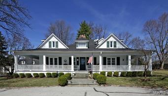 Home has been updated throughout to reflect today’s lifestyle while maintaining the beauty & character of its 100+ year old Ladue history!  Welcoming wraparound porch leads to front foyer w/ stone fireplace.  Spacious living room w/ French doors, high ceilings & fireplace.  Formal dining room will entertain large gatherings.  Cozy den w/ French doors lead to porch.  Newer eat-in white kitchen w/ granite counters, top-of-the-line stainless appliances & large family room w/ fireplace & 3 sets of French doors leading to terrace & yard.  Upstairs is the spacious master suite w/ his/her custom walk-in closets, built-in dressing table & newer marble bath.  3 other bedrooms-1 ensuite-2 share newer Carrera marble hall bath.  Beautiful architecture & moldings, hardwood floors, newer 1st floor laundry, terraces, patios & a stone path leads to private guest house w/ newer Carerra marble bath.  3-car garage w/ living space above.  Situated on quiet cul-de-sac. Walk to Reed School.
