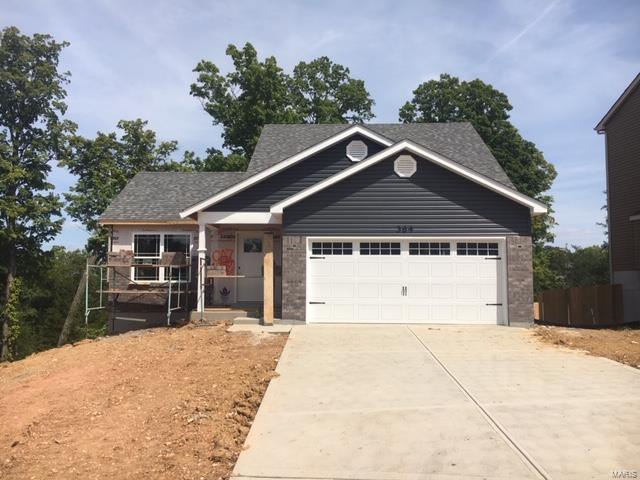 BRAND NEW home with every option you could imagine! They include vaulted ceilings, rounded “bullnose” corners, granite or quartz countertops, stainless steel appliances, 42" cabinets with "cushion close", custom neutral-colored paint job throughout, LVT flooring throughout most of the home, framed windows, taller baseboards, adult-sized cabinets in bathrooms with marble countertops, walk-in closets, upgraded carriage garage doors with openers, full bath rough-in, panel doors (many varieties), and upgraded water/light fixtures throughout the house! MAIN FLOOR laundry (in most models)! Fully sodded yard (front/sides/back). *Pictures are of previously built homes. Home is estimated to be completed Mid May.