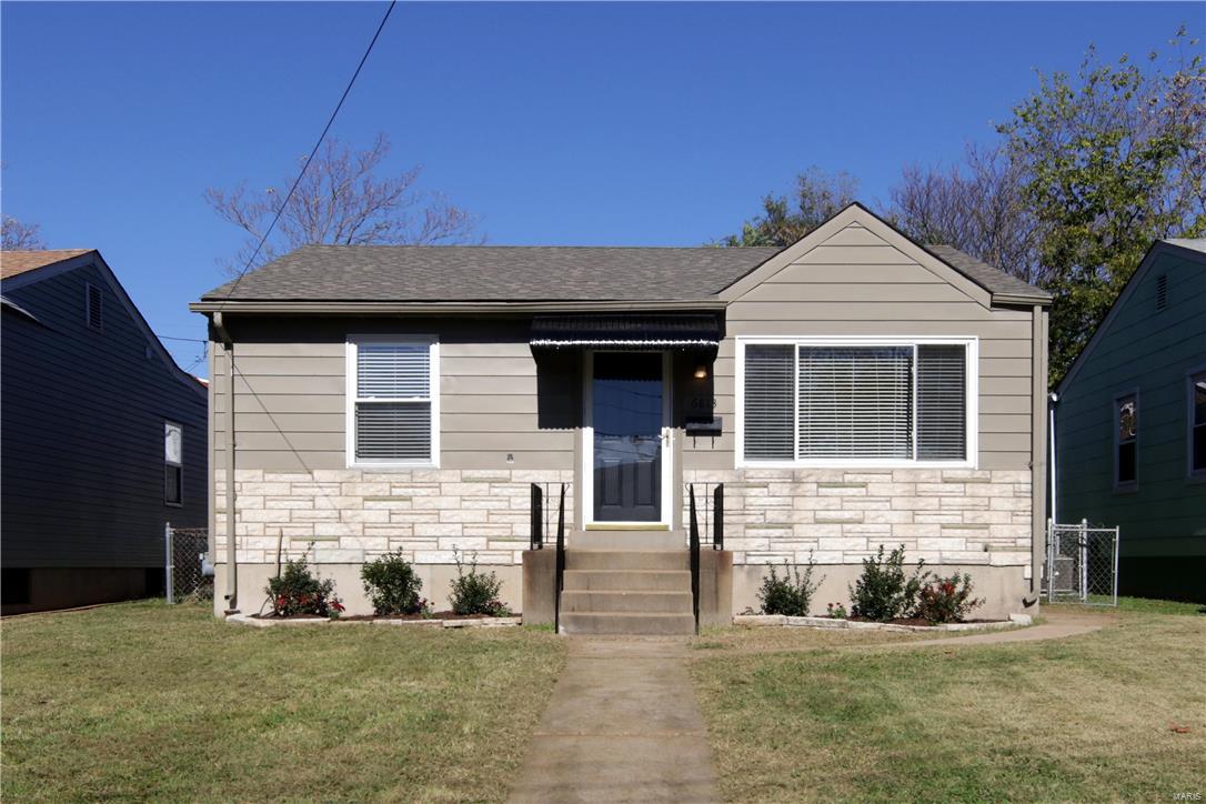 This darling, well maintained bungalow is sure to charm you with abundant natural light, beautiful hardwood flooring, updated  retro kitchen and updated bath just to name a few. Spacious family room/dining room/office addition right off of the kitchen,  offers plenty of extra space and versatility as well as pleasant views of  the large, level fenced yard. Several other updates include newer windows, electric panel, HVAC, and roof. Fantastic Dogtown location, central to both Hwy 40 and 44.
