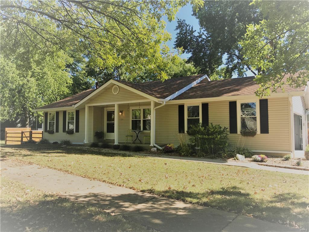 Classic charm and modern updates come together in this incredible 3 bedroom/3 bath ranch home. This home welcomes you in with a sun filled living room, spacious kitchen with stainless appliances and a comfortable breakfast room with wood burning fireplace. Additionally, this main floor boasts ceiling fans and beautiful hardwood and laminate flooring throughout. The finished walkout basement is great for entertaining in the rec area or just relaxing next to the gas fireplace. Two extra rooms provide space for additional bedrooms and/or office. And let's not forget about those pups...they even have their own built in dog houses. Take a stroll out to the back yard and you'll enjoy plenty of options to savor some quiet time. For example, on the patio under the pergola or on the private deck, just to name a few. All of this and so much more could be yours....but hurry, this home won't last!