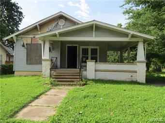Tear down for the lot, or repair to bring this elegant, spacious story and a half bungalow back to its glory. Fire damaged home is for sale as-is, where-is. Off street parking and detached garage. SpecialListingConditions: Foreclosure