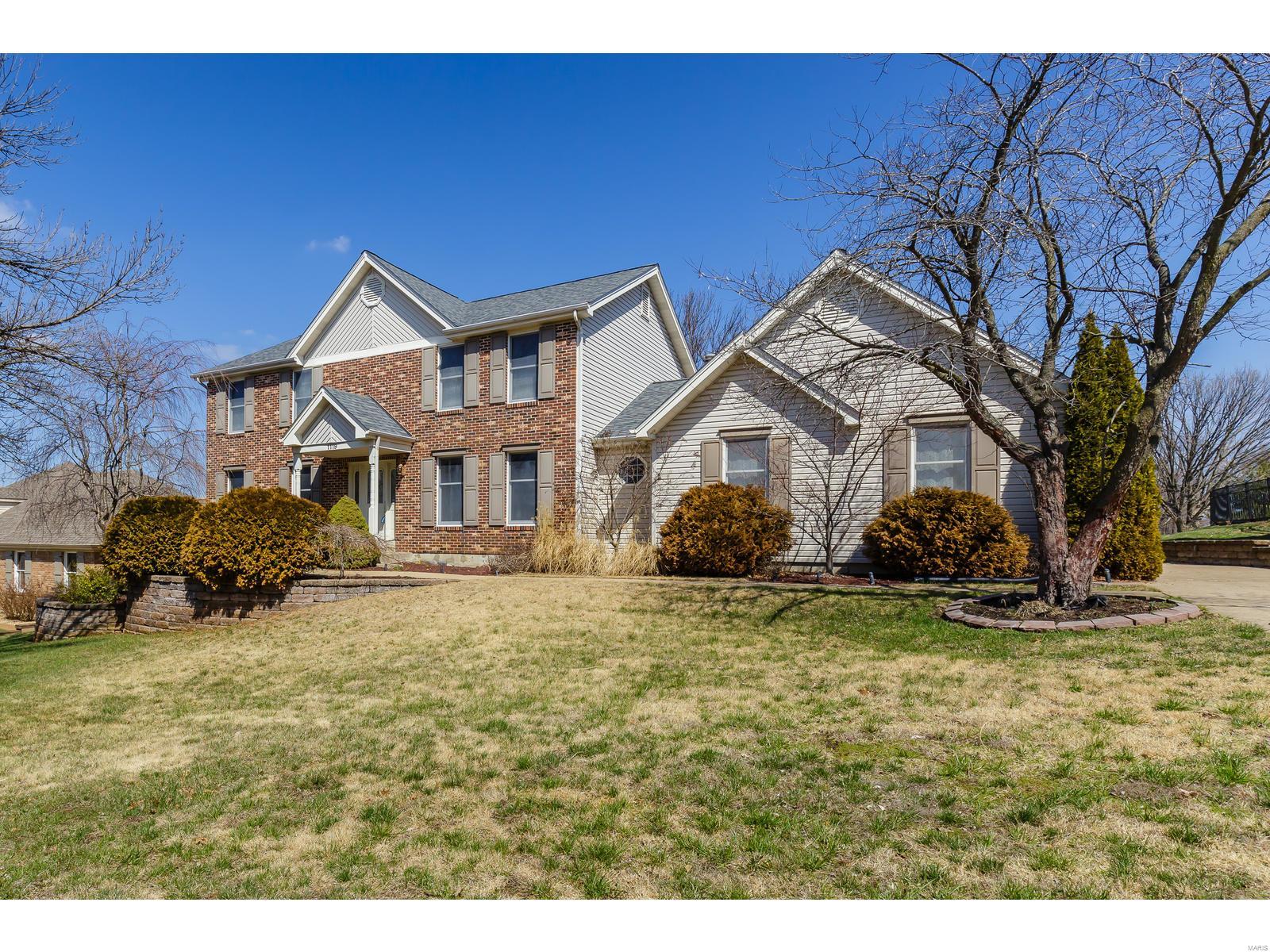 Rave Reviews are coming from this Stately Affordable Home Situated on a Premium Lot that Backs to the Golf Course.Step thru the Lead Glass Door to find A Spacious Separate Dining Rm w/Crown Molding, Formal Living Rm Perfect for a Den/Office or that Grand Piano, Family Rm w/Cozy Fireplace Features Marble Surround & Wood Mantle w/Dental Molding. Wet Bar Between the Family Rm & Kitchen w/Large Breakfast Rm, Center Island w/Overhang, Ceramic Tile Floors, Ceramic Tile Backsplash, Granite Countertops, Frigidaire Gallery Built In Oven & Microwave, Wood Cabinets w/Crown Molding, Smooth Top Cooktop & MFL. Master Suite w/Luxury Bath Sep Jetted Tub & Shower, Double Bowl Sink, Newer Light Fixtures, Attic Fan, Water Softener, Wood 6 Panel Doors & Trim. Finished LL w/2 Sleeping Rm w/egress, Den/Office & Full Bath. Newer Roof w/Architectural Shingles. Huge Deck w/Awesome View. Rear Entry Garage. Lake Saint Louis Amenities Include 2 Lakes, Clubhouse, Pool,Golf, Tennis, Marinas & Exercise facility.