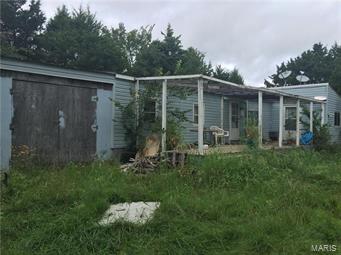 Bank Repo lots of space in quiet area nearly 3 acres very close to schools. Home needs some TLC however this property has possibilities and sits on an excellent lot in a very private setting. SpecialListingConditions: Foreclosure