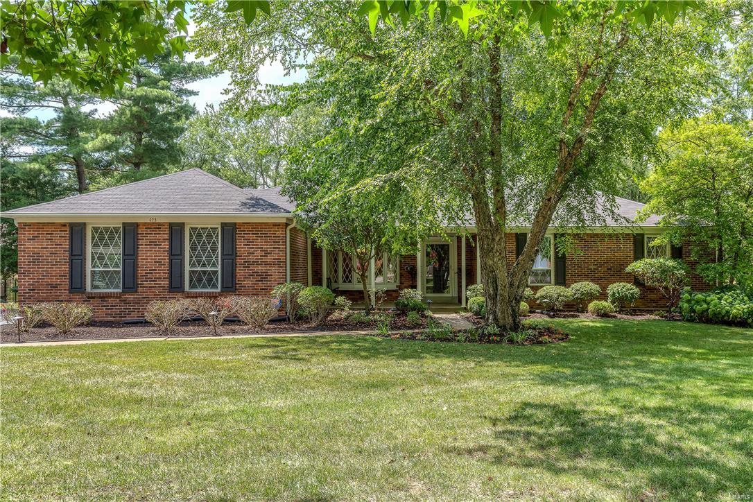 With almost 3700 sq ft of living space, this stunning open floor plan ranch in a desirable West county location offers the best of style, features, & a tree lined setting. Near a wide variety of shopping, restaurants & parks, this home has it all.  This house is perfect for entertaining large groups or intimate family gatherings. A truly stunning Great Room serves as the centerpiece of this house. Beautiful wood floors. Main floor Master bedroom suite. Kitchen w/Silestone counter tops, stainless steel appliances, & center island. Separate Dining room. Amazing finished lower level with an expansive family room, bar, 2 bedrooms, play room, full bath, exercise room, & gas fireplace. Main floor laundry. A screened in porch, patio, outdoor fireplace & play set complement this great back yard . Professional landscaping. With easy access to I-64/141/270, the convenience and quick access to all parts of the St. Louis area are evident with its great location.