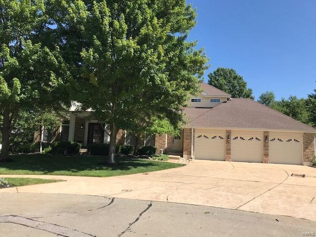 Wow! This house has all the bells and whistles! "A Must See"! So many amenities- new kitchen 42" cabinets with crown moulding & pull out shelves, granite countertops, double oven, warming oven, beverage center island, open airy floor plan, mud room on main level, formal dining room, office, spacious great room with bay, breakfast room open to sunroom which walks out to 37x20 patio. New oak and wrought iron staircase, 4 bedrooms and 2 full baths on 2nd floor, children's bath recently remodeled, plus laundry room/craft room. Hardwood floors on 1st and 2nd floors. Finished lower level with complete kitchen and full bath plus 5th bedroom, large rec room and a 11x5 wine cooler room. 3 furnaces, 3 a/c units, sprinkler system, alarm system, 3 car oversized garage. Any offers will be reviewed 7/20/20 at 7:00 p.m. Additional Rooms: Mud Room, Wine Cellar