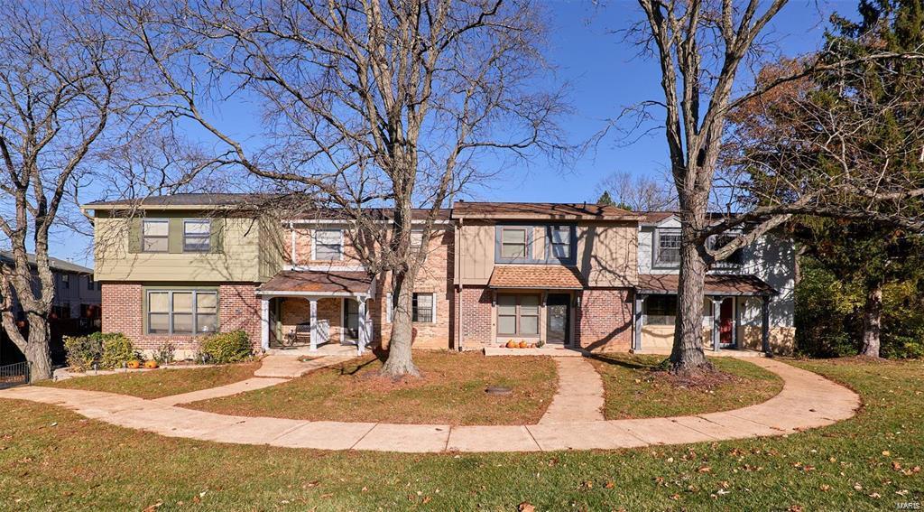 Beautiful End Unit Townhouse with attached one car garage located at the back of a quiet community in the heart of Ballwin. Surrounded by common ground and quick access to anywhere in West County in no time! You will be welcomed by a tiled entryway and neutral colors throughout! Powder Room and coat closet complete the foyer area. Living / dining room combo flows into an eat-in Kitchen with custom cabinets with pull out shelves and a breakfst bar. The kitchen opens to a large, private deck and patio that overlooks the common ground and is perfect for outdoor living and BBQ. The large master suite is complete with walk-in closet and full updated bath. 2nd BR is a good size and has its own updated guest bath. Enjoy community amenities including pool, tennis and a clubhouse! Convenient location by Hwy 270 and Manchester, close to major shopping, parks, and restaurants! Additional storage in the unfinished basement and washer/dryer and HOA fees all INCLUDED in lease price! Apply today! Location: End Unit