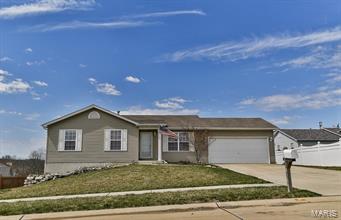 This home is USDA Eligible!!! Wonderful, clean and ready for you, 3 Bedroom 2 Bath, One Owner Ranch style home.  Open floor plan with vaulted ceilings greet you as soon as you enter.  17X14 Family room warmly invites you in with beautiful 5" wide plank easy to care for Pergo flooring that continues into the Dining room and adjoining Kitchen.  Dining room features a convenient slider walkout to the 20X16 Deck with a 7' wide stairway leading to the backyard.  Kitchen offers smooth top electric oven/range, double sink with pendant lighting, beautiful cabinetry, pantry, and access to the Garage.  Master Bedroom provides a walk in closet, chair railing and a private Bath with a step in shower and Pergo flooring.  Second Bedroom offers wood crown molding, built in shelves and a spacious closet.  Third Bedroom features wainscoting, decorative wood shelves thru 3/4 of the room and a spacious closet.  2 car Garage and enclosed soffits.  Within walking distance to Winfield's Primary school.