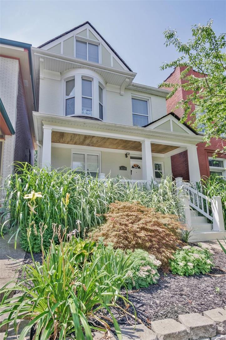 Beautifully updated home on a terrific block in Historic Shaw! Surprisingly spacious, all-brick home features 5 brs, a stylish kitchen and a sought-after open plan. Updates include beautiful new hardwood on first AND second floors. Smart master suite offers great storage and sleek finishes. Two more bedrooms and a roomy full bath on 2nd floor, with two more great bedrooms or bonus rooms on the third floor. So many ways to use the space! Newer windows throughout and efficient, electric hvac system promise year-round comfort indoors. Outdoors, You'll love the wide covered front porch, expertly landscaped front yard, private backyard with stamped patio and spacious, newer garage! A short walk to Sasha's Wine Bar, the Shaw Dog Park and St. Margaret's School, not to mention the Botanical Gardens and Tower Grove Park. Don't miss this opportunity to enjoy City living at its finest!