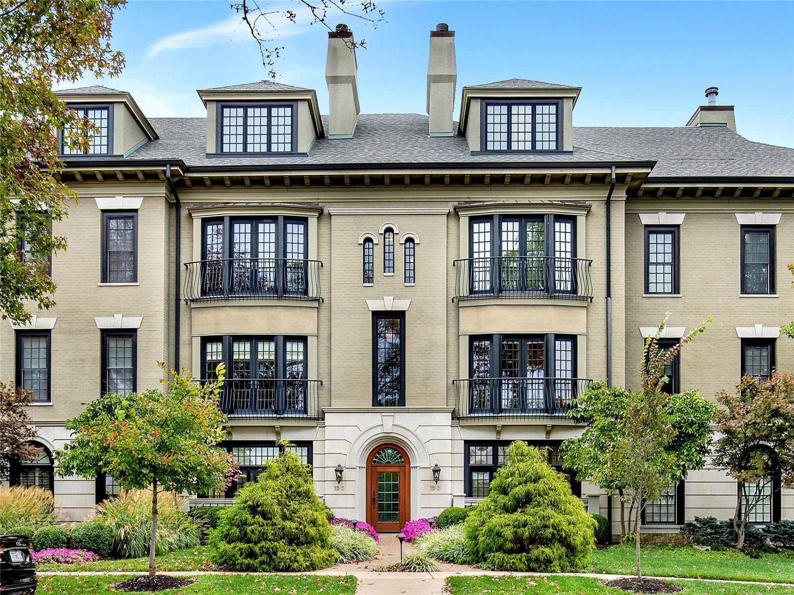 Wonderful first floor condo being offered by the original owner offers one level living in a premier mid-rise complex in walkable Clayton! Sophisticated details inside & out with spacious rooms. Welcoming entry foyer leads to gracious living room with built-in bookshelves flanking gas fireplace. French Doors open to Juliet balcony with view of Shaw Park. Dining Room could host formal or informal dining.  Large master suite boasts stunning bathroom & walk-in closet. Second bedroom suite or office with private bath. 2 BR, 2.5 baths, high ceilings, beautiful millwork, powder room & laundry room. The beautiful ceramic tiling throughout is easily maintained. Features 2 car parking, 2 garage storage units & elevator to all floors. Walk to The Centre of Clayton, restaurants, groceries, shops. Location: Ground Level