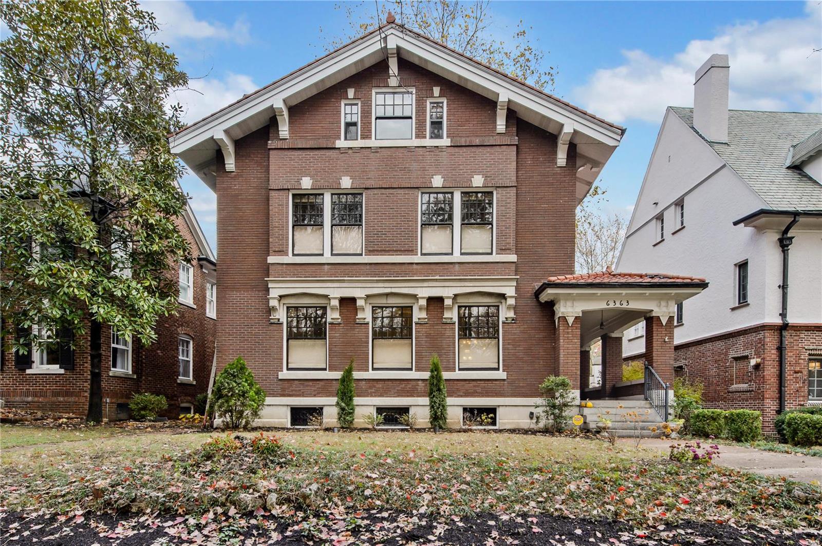 Stately brick home in historic Parkview neighborhood with many outstanding architectural features. Architect designed renovation. Side porch & entry provide a private feel. Beautiful period woodwork & hardwd floors, high ceilings, stained glass windows, impressive foyer w lighted stair newel post, fabulous functional glass pocket doors. Front & back stairs. Spacious Living Rm w fireplce & beamed ceiling. Dining Rm w coffered ceiling. Charming powder rm. Renovated Kitchen w center island, high end appliances: Wolf cooktop & convection oven, Sub-Zero refrig, 2 other freezer drawers, Asko dishwasher, Kohler porcelain enameled farm sink, marble counters, custom cabinets. Adjacent Fam Rm/Breakfast Rm. Renovated baths. High end plumbing fixtures: Grohe, Hansgrohe, Toto, Rohl, Duravit. Large screened porch & brick patio. Second flr laundry. 3 BRs & 2 baths on the 2nd floor. 3rd flr has 2 BR, 1 bath & bonus rm. Great closet space! Zoned A/C, 200 amp electrical service, detached 2 car garage.