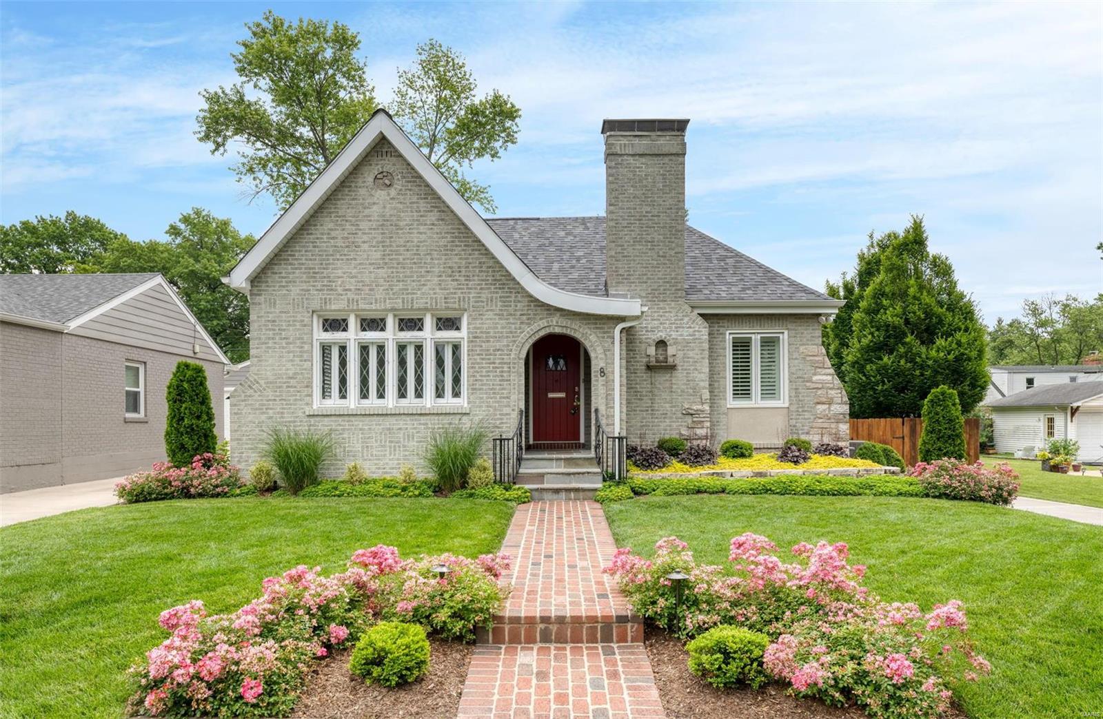 Welcome home! This beautifully renovated bungalow has a sophisticated interior, great deck, & gorgeous private yard! Perfectly updated with contemporary style & taste, yet maintains classically desirable features like original leaded, stained-glass windows in the front room & arched doorways. Updated kitchen with new cabinets, Quartz counter tops, stainless-steel appliances (all included in home sale), and custom pendant lighting over breakfast bar. Primary suite has hardwood floors, crown molding, recessed lighting, built-in bookshelves & large en-suite w/ glass shower enclosure and double vanity. 2nd bedroom has 16’ cathedral ceilings, large walk-in closet, hardwood floors, & beautiful private bath. To top it off, this lovely home is walking distance to Ladue shops, restaurants & schools! Don't wait, schedule your tour today!!