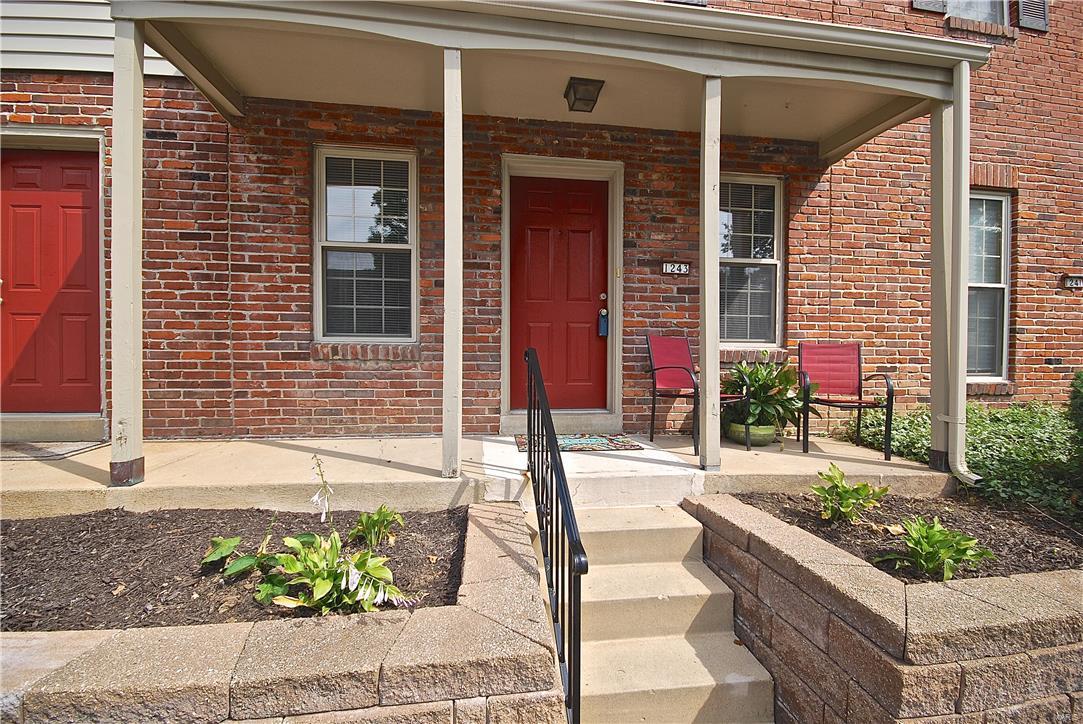 Awesome Updated 2 Bedroom, 1.5 Bath Townhome in Ellisville’s hidden gem, Clarkson Townhomes - Rockwood School District/Marquette High.  Must See, Pristine & Move In Ready with a partially finished Lower Level. Beautiful Covered front Porch welcomes you home. Main Floor features, Living Room with gleaming laminate flooring flowing to the Breakfast Room & Kitchen. Kitchen offers Maple cabinets, and stylish black appliances. Charming Breakfast Room w/sliding door to spacious privacy fenced patio great for relaxing & entertaining! Updated Powder Rm completes the main level. Upper Level has 2 nice size Bedrooms and an Updated Full Bath w/adult height vanity & ceramic tile flooring. Lower Level includes a Family Room, laundry and storage area. Secluded neighborhood boasts community swimming pool and is walking distance to restaurants & shopping. Convenient West County Location is quick to: Parks, Highways, Shopping, Dining & Library! Location: Suburban