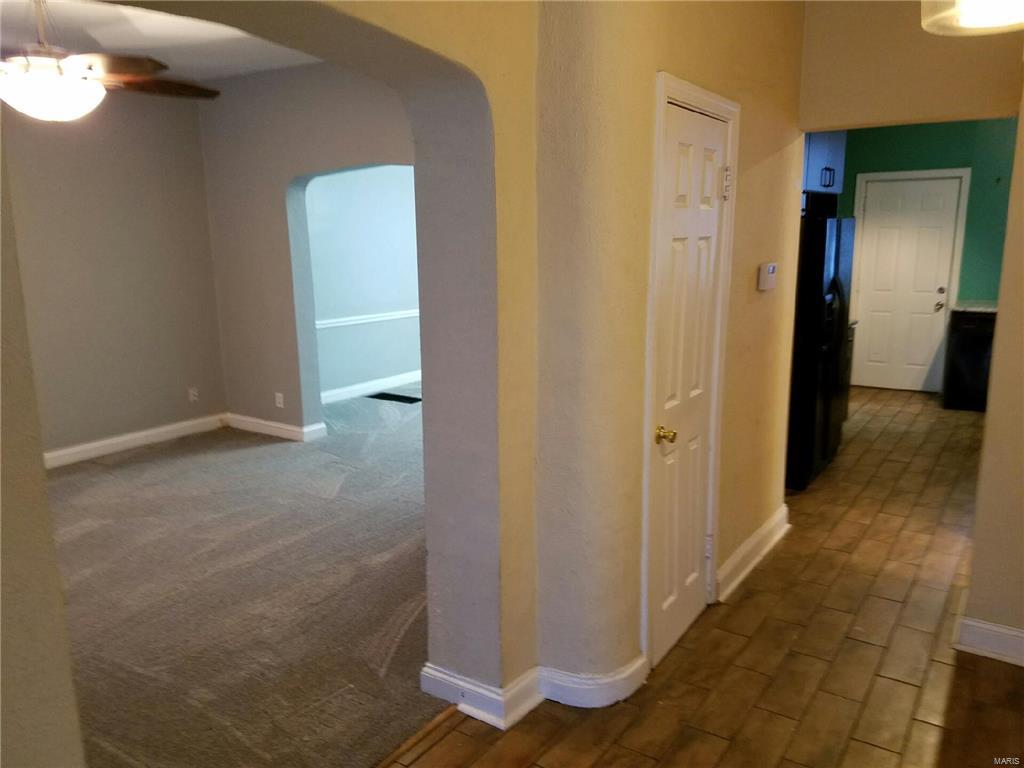 Wow! Fabulous 2 Story Home on a Quiet Street in South City. All New Carpeting and Fresh Paint on the Main Level! Wood Floors in Bedrooms. Large Living Room and Dining Room with Sun Porch/ Possibly Den.  Updated Kitchen with 42" Cabinets and Granite Counter-Tops. Under Cabinet Lighting and Stainless Steel Appliances.MUST SEE the Over-Sized Bedrooms with LOTS of Closet Space. Unfinished Walk out Basement with Front Loading Washer and Dryer. Check out the HUGE FENCE IN BACKYARD! Perfect for a BBQ/ Picnic Table and Lots of Running Space for an Owner Approved Pet. Walking distance to Post Office, Shopping, Restaurants. This Rental will not Last long!