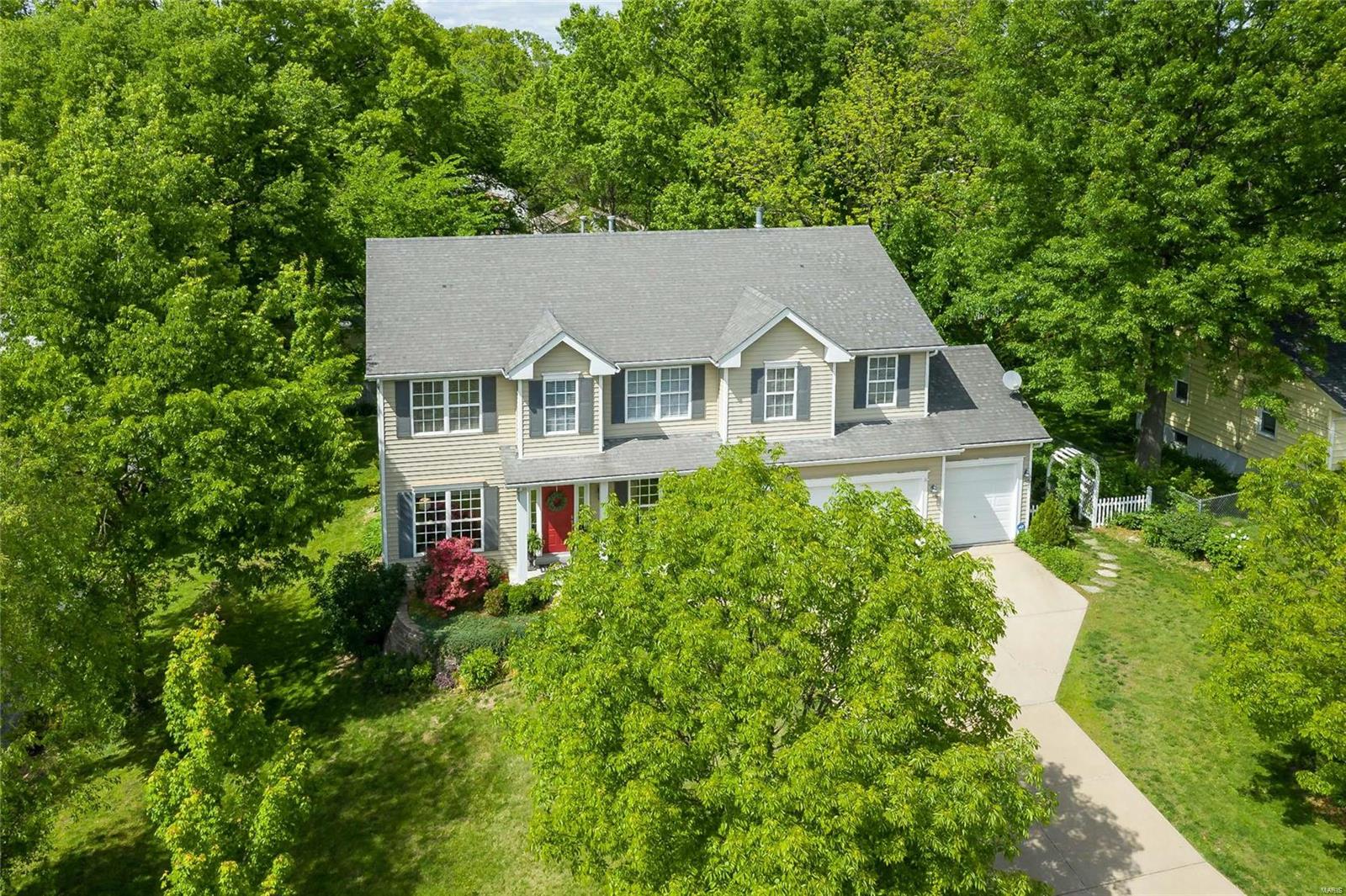 CERTIFIED PRE-OWNED HOME has passed all inspections! Meticulously maintained 4-bedroom 3-bath 2-story in Kirkwood w/ BONUS 3-car garage on almost 1/3 acre!  Newer 5" hardwood floor throughout 1st flr.  Family/friends will gravitate around the center-island breakfast bar in kitchen with NEW quartz counters, NEW subway backsplash and stainless appliances including a NEW GAS cooktop plus planning desk.  Meanwhile the kids can chill in the 2nd floor FLEX ROOM and entertain friends, do homework, play with toys/games and watch TV. NEW carpet in FLEX RM & 4 bedrooms. Master suite features a GAS FIREPLACE, huge walk-in closet, double sink vanities, multiple-head shower & jet tub. 3 addtl bedrooms have walk-in closets! Main floor laundry is a ROOM, not a pass-thru and features sink with counter space plus a large closet (turn that into your kids' backpack/coat nook).  Finished LL rec room with egress window and R/I FULL BATH.  5-year CHOICE WARRANTY included. Lovely lush shaded yard!