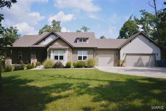 Beautiful home in Timberlake Trail Subdivision. Home features granite countertops, stainless appliances, hardwood flooring, tile shower, whirlpool bath, and Full walk-out basement.