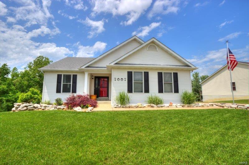 Welcome to this spacious, open concept, farmhouse styled ranch home! The welcoming entry foyer opens to hand-scraped engineered hardwoods leading you to a beautiful kitchen w/custom center island, some stainless steel appliances & views of the vaulted dining & great room featuring floor to ceiling pallet wall fireplace wall w/custom mantle. The hardwood floors flow into the 3 bedrooms which are nicely sized, have ceiling fans, another pallet wall & an expanded master bedroom w/5 window bay, walk-in closet & spacious master bathroom w/separate shower, large corner soaker tub, & double sinks w/yet another pallet wall. The large unfinished, walk-out lower level is begging to be finished & offers a bath rough-in & an egress window where your 4th bedroom could be. The cedar deck overlooks the large fenced backyard perfect for pets & family gatherings. Neighborhood amenities include multiple pools, walking/running trails, sports fields, lakes & more.