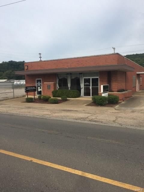 A desirable location in the middle of Piedmont. Level lot along the main business street in the town and a through fare in the community. Easily accessible to all areas of town and a visible location. One story brick building. Office space, meeting rooms, storage area and 2 vaults which would be ideal as an office where security is important. Location: City