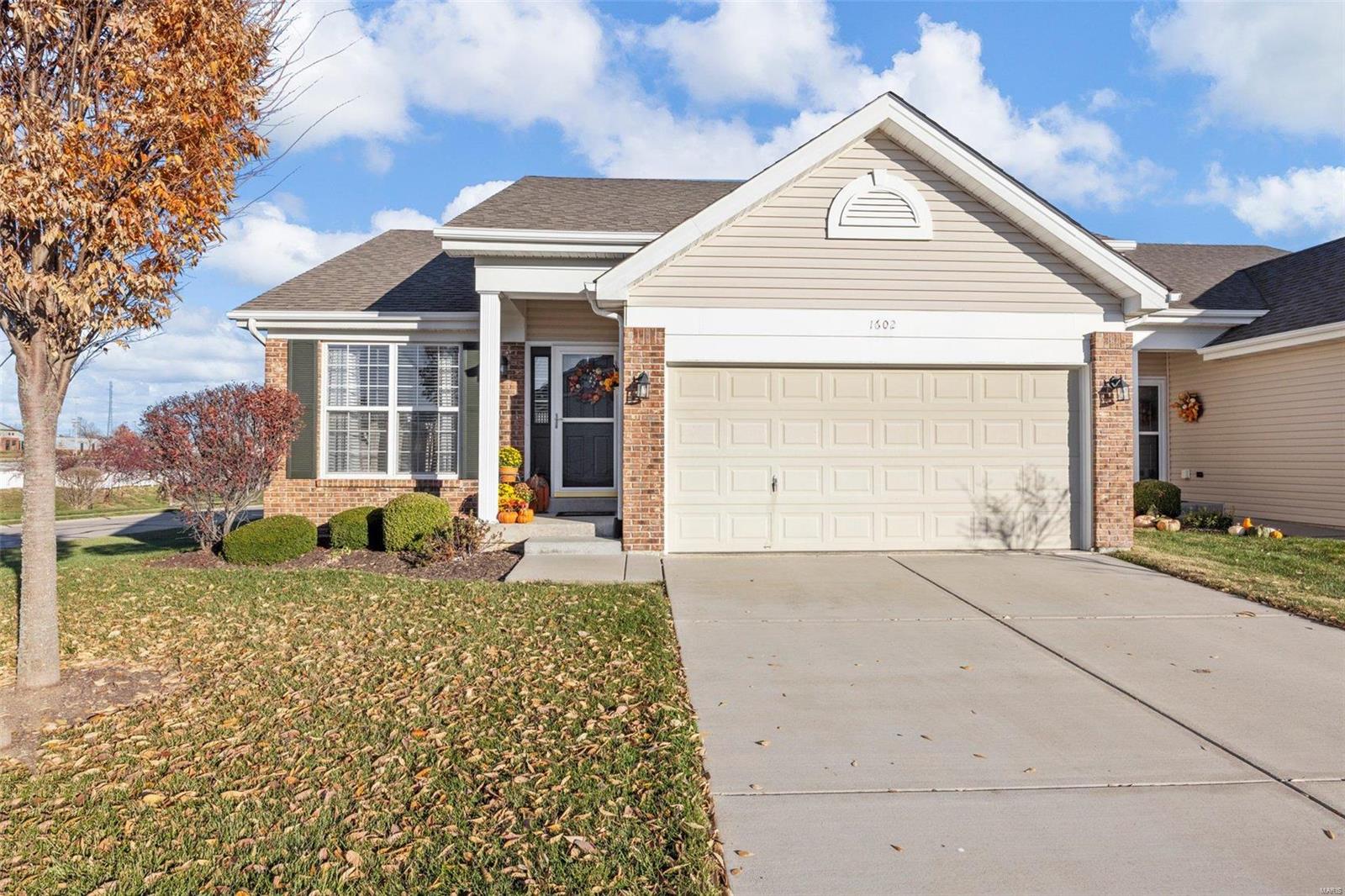 WELCOME HOME to this charming 2BR 2BTH villa in the heart of O'Fallon. This maintenance free end unit villa offers beautiful curb appeal featuring vinyl front w/brick accents, lush landscaping & 2 car garage. Walking in you'll notice the open floor plan w/all new flooring including the spacious living rm. You'll LOVE the kitchen offering custom cabinetry w/crown, SS appliances (all included), bkft bar & bkft rm w/slider to the deck perfect for relaxing outdoors. The main floor primary rm offers a LG walk-in closet w/organizer. Add'l BR, full BTH & laundry complete the main. The finished LL provides a LG family rm, den, bonus or possibly sleeping rm & full BTH giving you over 1600 SF of living space. Fantastic location w/easy access to major hwys, great schools, shopping, dining & just a quick drive or walk to the library, park & the O'Fallon Hoots Prospect League baseball stadium. HURRY this will not last long. A MUST SEE! Location: End Unit, Ground Level, Suburban