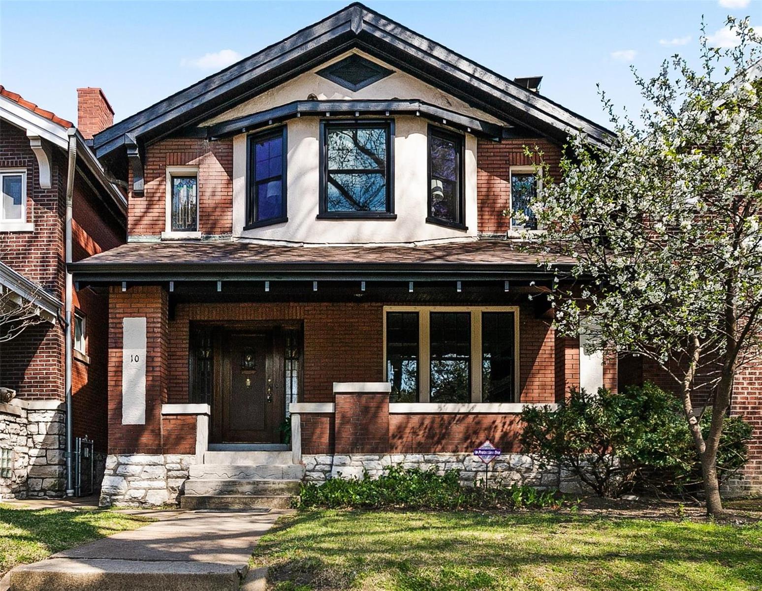 This classic 1915 house has the charm to admire & the modern updates you desire! Hdwd flrs.  Original stained-glass windows thru out (13 in total!) Beautiful boxed ceiling beams w/ ornate lighting in the formal dining rm. French doors leading out to the four-season sunroom. A pocket door opening up to the quaint powder rm.  The mstr bdrm is not only massive but has character (and has 2 walk-in closets!) The full bth on 2nd flr has been updated w/ a touch of charm, class and modernization. If that is not enough, maybe these new items added in 2020 will get you hooked: roof, hvac, windows, updated plumbing, updated kitchen (w/ granite countertops!) Not to mention there is another full bth in LL AND there is a 2 car garage out back. Don’t overlook the location of this beautiful house:  walk to the Science Ctr, The Grove, Forest Park (take the hidden path under hwy 40!) You are a mile from CWE & The Hill. Need I say more? How about a Home Warranty Plan? You got it!  (Agent owned) Additional Rooms: Sun Room
