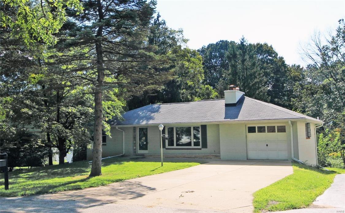 Fantastic opportunity to own a 2 bed, 2 bath home or build your dream home on over a 1/2 acre lot in highly sought after Ladue schools. Current home to be sold "as is".
Buyer shall grant Seller a perpetual, exclusive easement for ingress and egress over the driveway easement area (shown on the survey provided by Seller).  Buyer agrees to execute any documentation required to grant such easement.