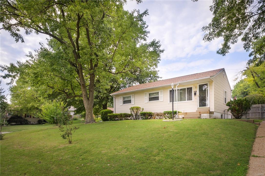 Location matters!  This cute 3 bedroom, 2 full bath ranch style home is nestled back in a quite neighborhood.  Original hardwood floors, 6 panel doors, newer HVAC, water heater, and newer windows.  Newer roof, siding, soffit and facia, off street parking, and fenced in yard on this corner lot.  Plenty of basement space, partially finished with one full bathroom. Conveniently located less than five minutes from highway 55, close to all the dinning, retail, & necessities you need.  This home has a splash of retro, and is ready to move-in.  It's a deal !