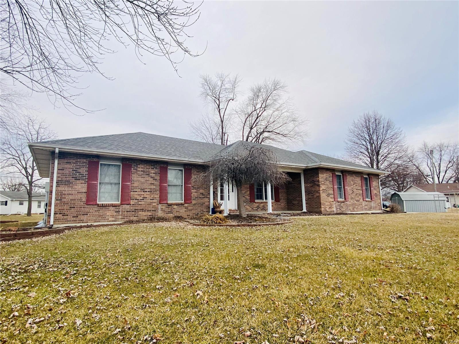 Gorgeous brick front home offering 3 bedrooms, 2 full baths on the main level. Separate dining room once you enter the foyer. Large kitchen with Brandkamp oak cabinetry with large pantry. The kitchen flows into a breakfast room overlooking the 18x19 vinyl deck. Kitchen appliances included in the sale, movable cabinet in kitchen is negotiable as well as washer/dryer units. Cozy 19x13 living room with gas freestanding stove. 14x13 master suite with remodeled master bath. 568+/- sq ft finished bsmt offering a 26x13 family room/ den area for entertaining/relaxing. 1 non-conforming bedroom with huge walk-in closet. Full bath and plenty of storage area. Laundry in the lower level. 2-car attached garage with lots of storage in the attic. Updates to the home includes: new roof, patio sliding door as of 2020, hot water heater (2019), furnace/ac (2015), garage door (2017), deck (2008), bathroom remodel (2014), basement finished (2002). Tons of updates! All of this on .46 of an acre! Must see!